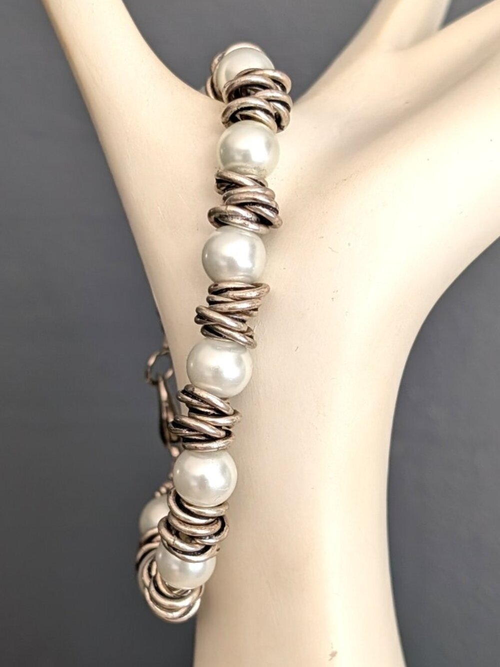 Faux white pearl bracelet with sliver link accents